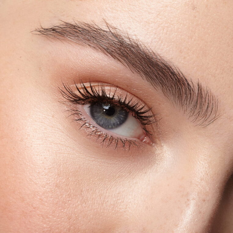 Up close image of patient with combo eyebrow tattoos