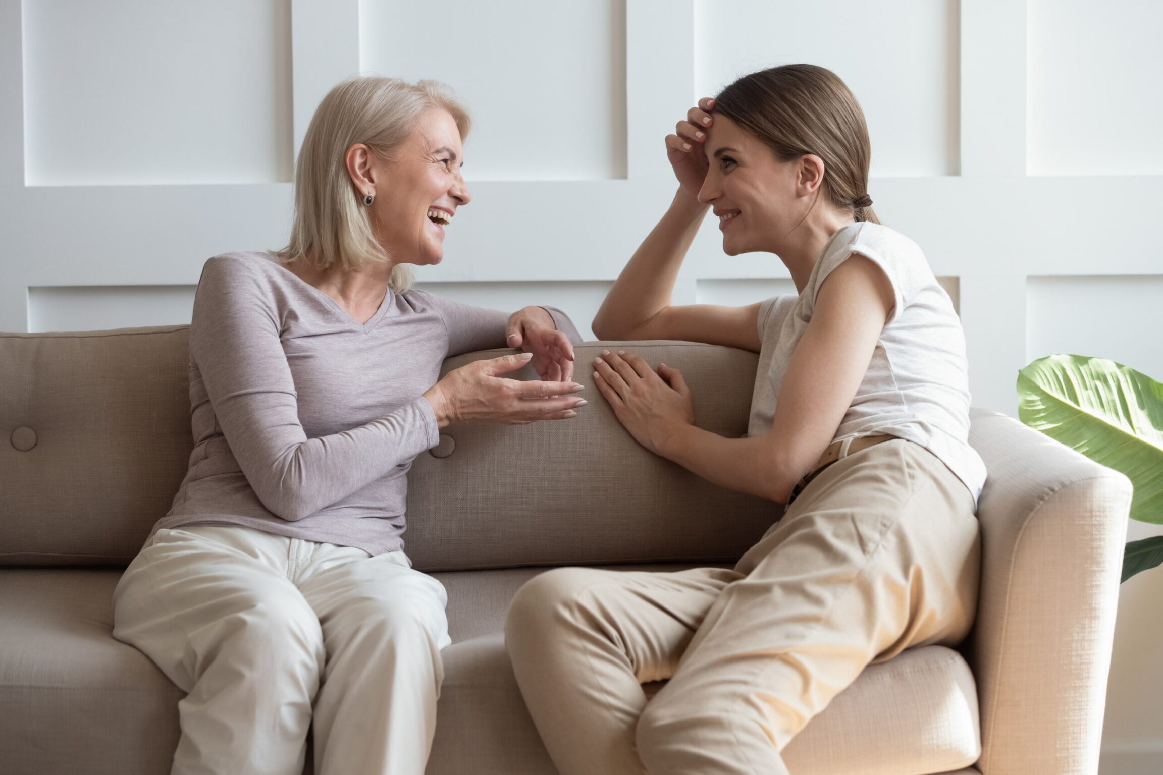 Two women discussing genetics and their weight loss journey